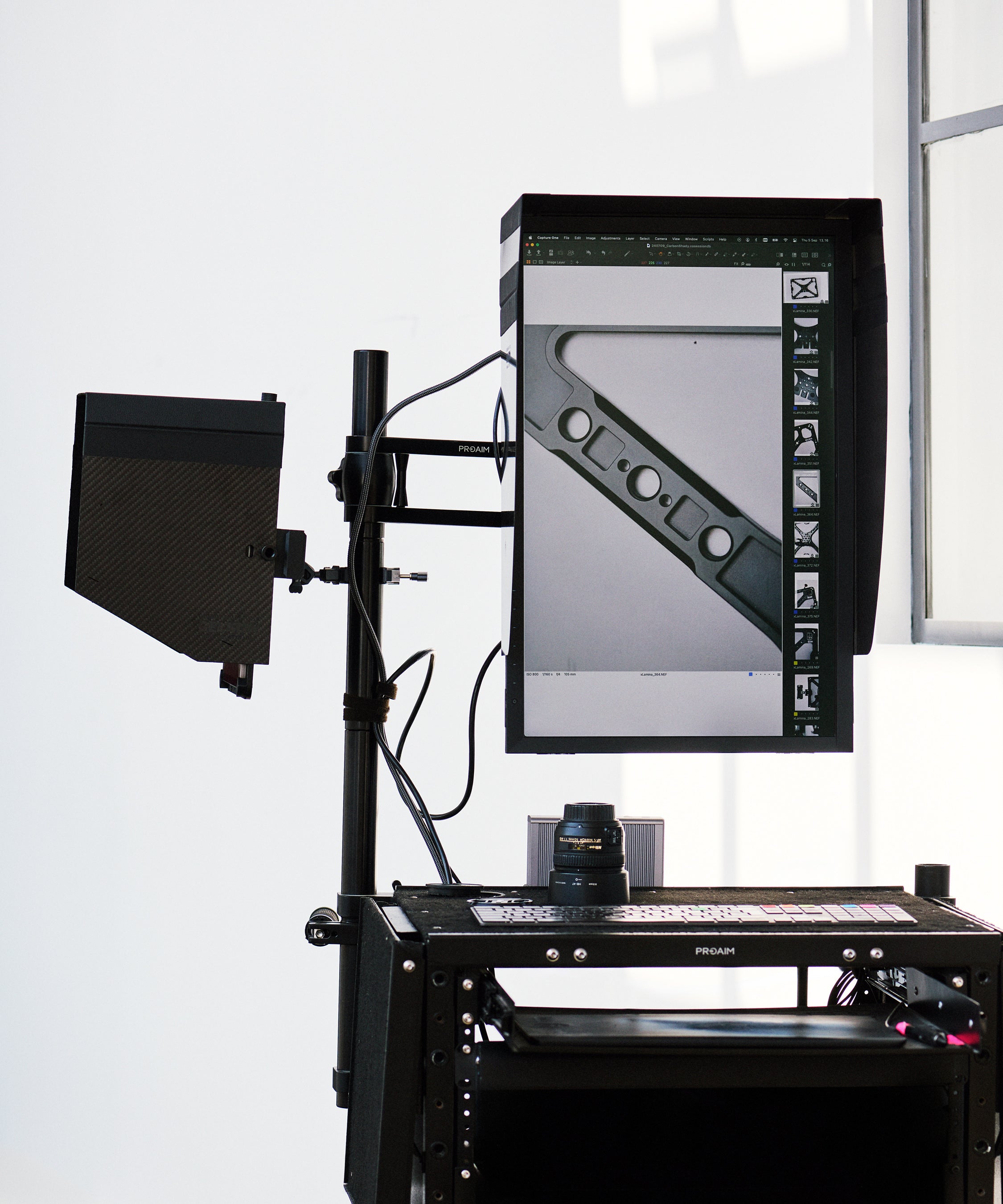 Carbon Fibre Hood for eizo screen in portrait orientation, mounted on an inovativ deploy type cart.  Additional iPad Pro used as a vertical screen on an xLamina iPad mounting system